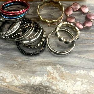 Bundle of bangle bracelets. Too many to count! My loss…jewelry clean out!
